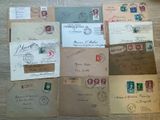 a lot of old letters and envelopes on the table