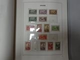 a picture of a picture of a book with stamps on it