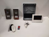 a white table with a microwave, a toaster, a toaster, a toaster oven and a toaster oven