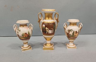 three vases that are sitting on a table