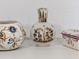 three different types of bathroom accessories sitting on a table