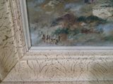 une image d'un tableau sur le mur d'une pièce