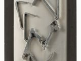 a picture of a cookie cutter shaped like a cat