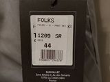 a label on the back of a jacket that says folks
