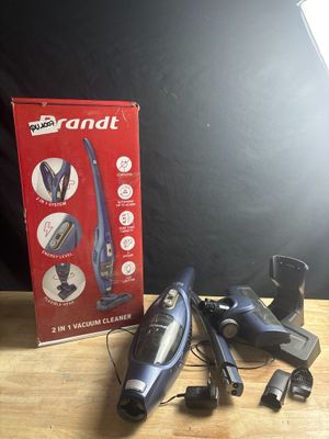 a box of vacuum cleaners sitting on a table next to a box of cordless vacuum cleaners