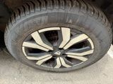 a close up of a tire on a vehicle