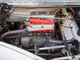 a close up of a car ' s engine with its hood open
