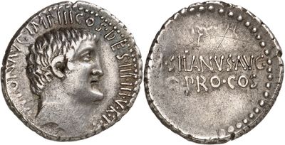 a silver coin with an image of a woman on it
