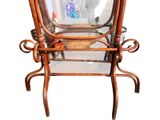 a chair that has a mirror on the back of it