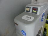 l'image d'une machine installée dans une pièce