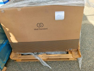 a cardboard box sitting on a pallet with a plastic wrap around it