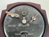 a clock that is sitting on top of a table