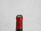 a bottle of wine that is sitting on a table