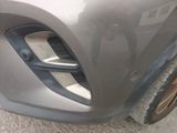 a close up of the front bumper of a car