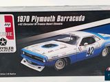 a box with a model of a blue and white race car