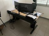 a desk with two computer monitors on it in a room