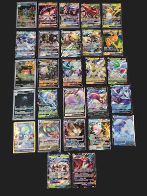 beaucoup de cartes pokemon différentes sur la table
