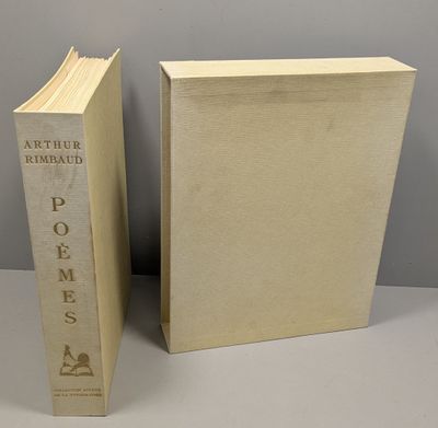 two books sitting next to each other on top of a table