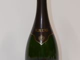 an image of a bottle of champagne on a table
