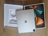 an apple ipad pro is sitting on a table with its box open