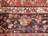 an image of a close up of a rug on a wooden floor