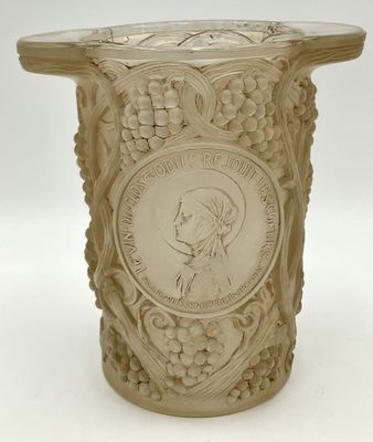 an image of a vase with a picture of a woman on it