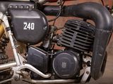 a close up of a motorcycle with a number on it