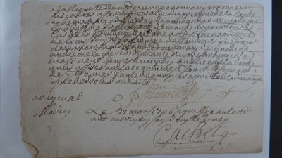 un morceau de papier sur lequel est écrit quelque chose, dans un cadre