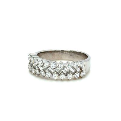 a close up of a diamond ring on a white background