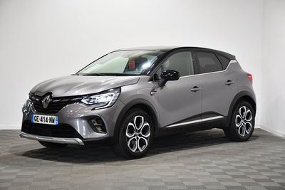 a grey toyota c - hr suv parked on a checkered floor