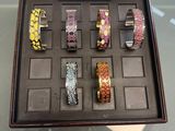 a display of bracelets in a box on a table