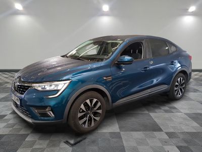 a blue suv parked in a garage with a checkered floor