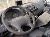 a steering wheel and dashboard of a truck