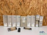 a lot of different types of electronic devices on a table