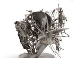 a metal sculpture of a horse with a bunch of wires attached to it