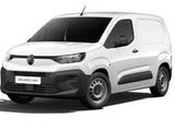a white van is parked on a white surface