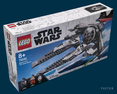 a box with a lego star wars tie fighter set in it