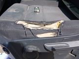 an image of a piece of luggage in the back of a car