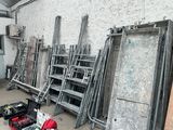 a room filled with lots of different types of construction equipment