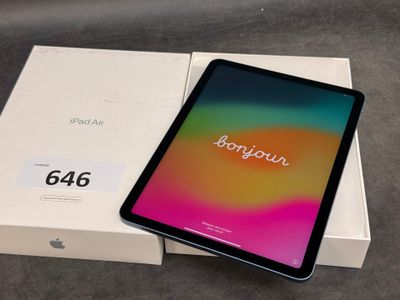 an image of a tablet computer sitting on top of a box