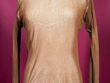brown long sleeved top on a mannequin dummy