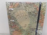a picture of a notebook with a world map on it