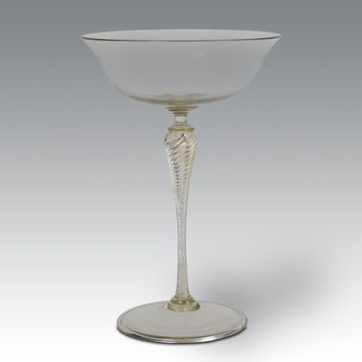 an image of a white wine glass on a silver base