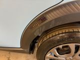 a close up of a tire on a car