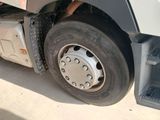a close up of a flat tire on a semi truck