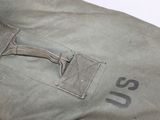 a close up of a bag with a handle on it