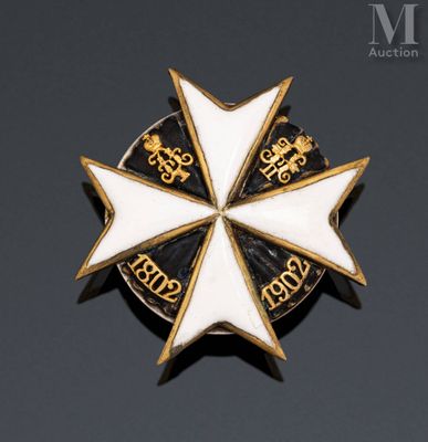 an image of a white and gold cross with a crown on it