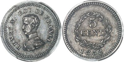 a close up of a silver coin with a bust on it