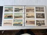 a book with pictures of ships on it on a table