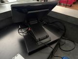 a laptop computer sitting on top of a desk